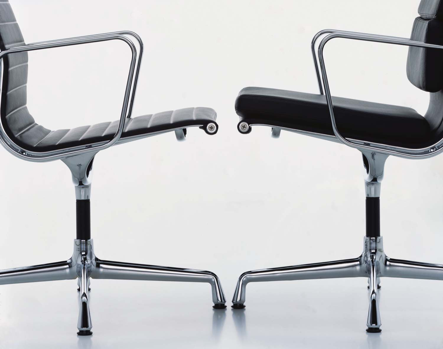 Eames Aluminium Chair and Eames Soft Pad chair, black leather