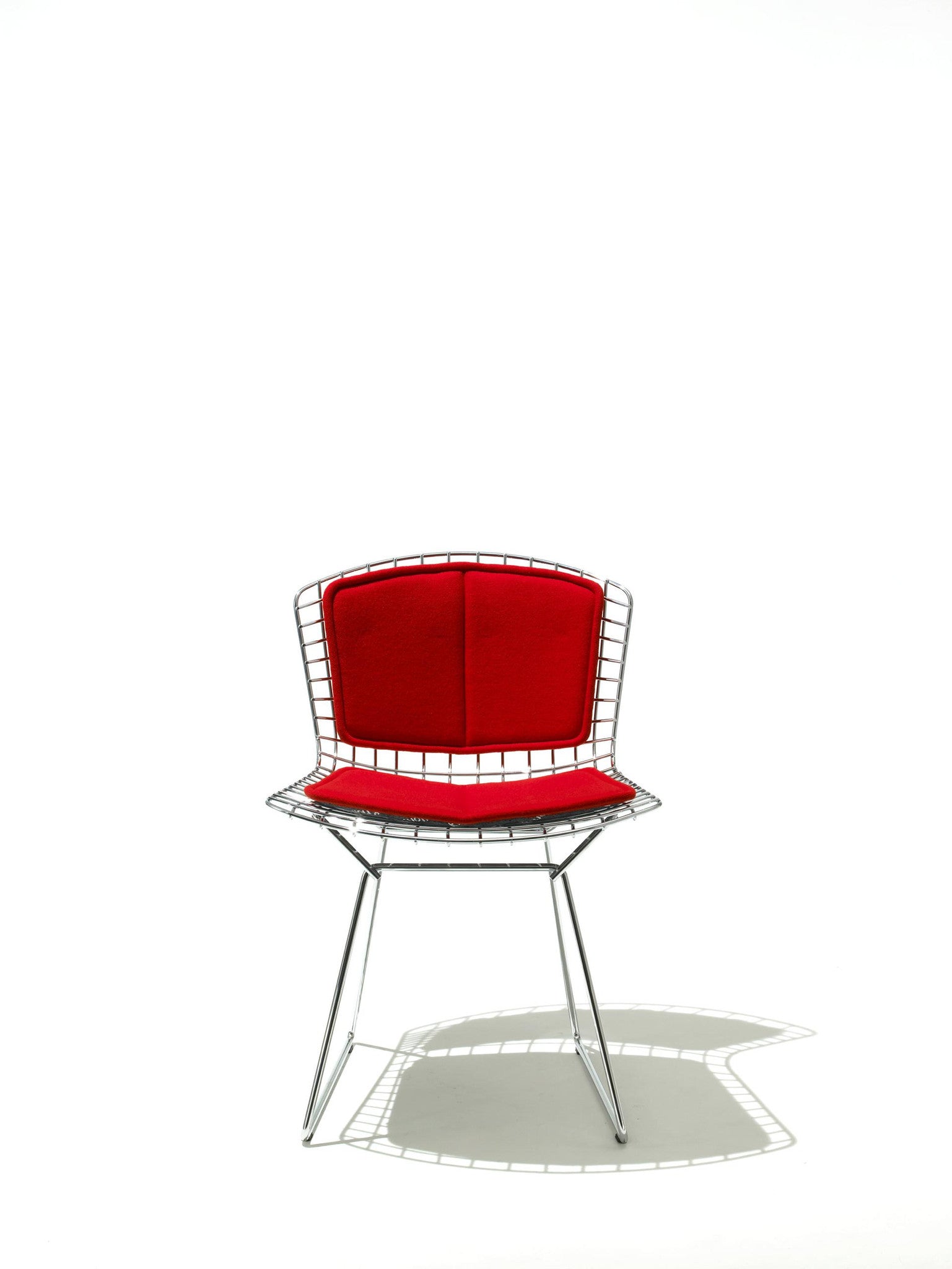 Bertoia Side Chair in chrome with a seat and back pad