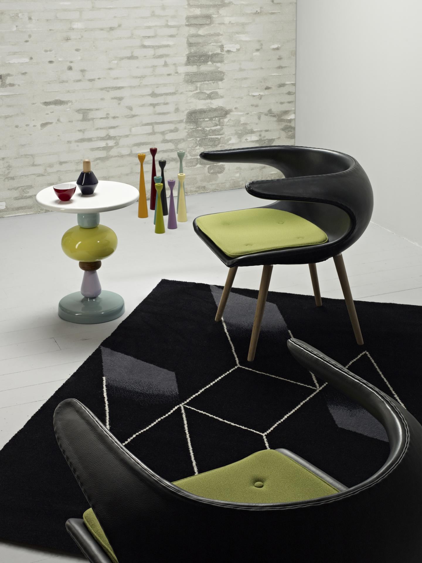 Frost Chair black leather shell and green cushions Frost Chair black leather shell and green cushions