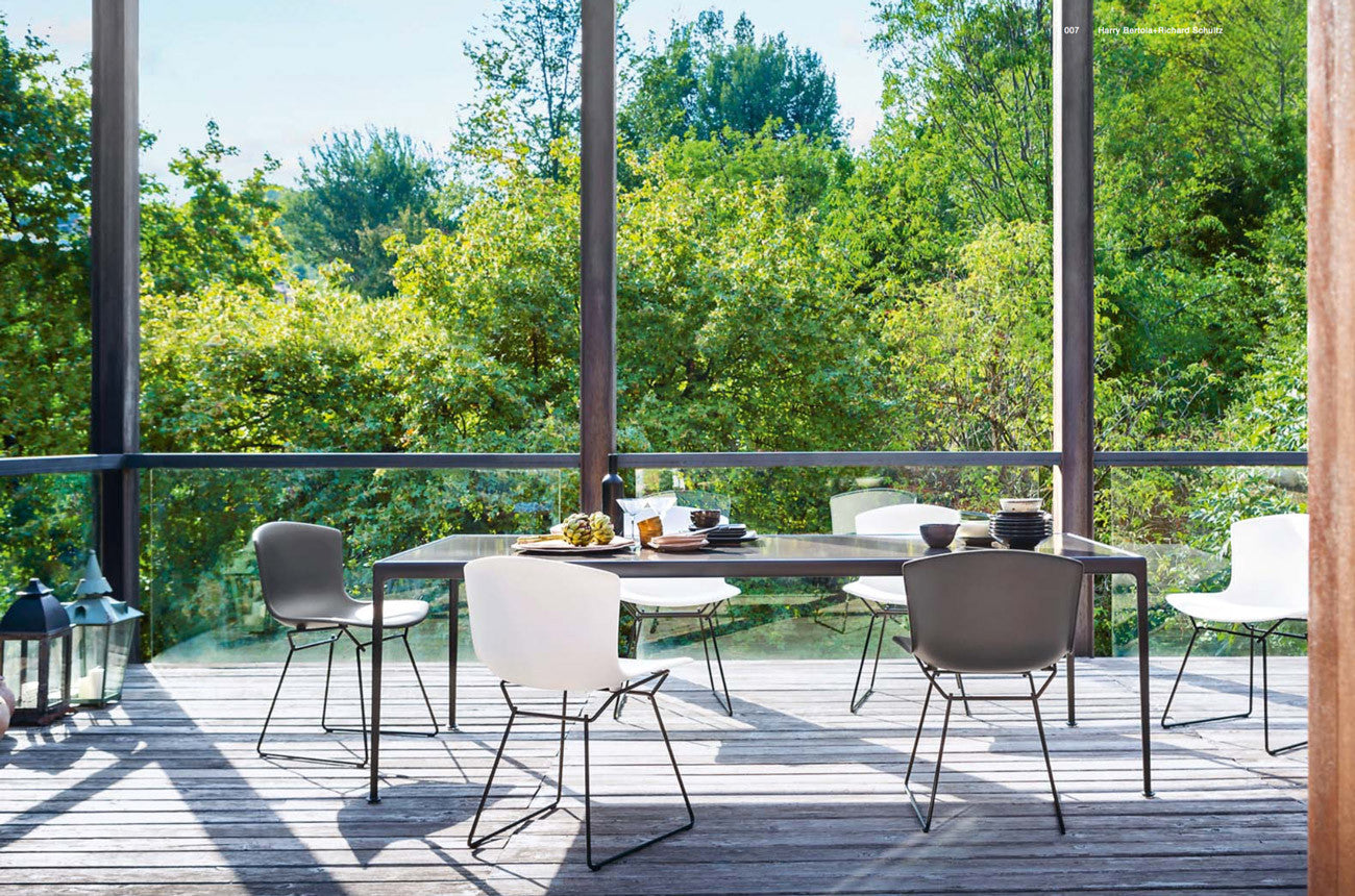 Schultz outdoor table, dark bronze porcelain top with onyx frame