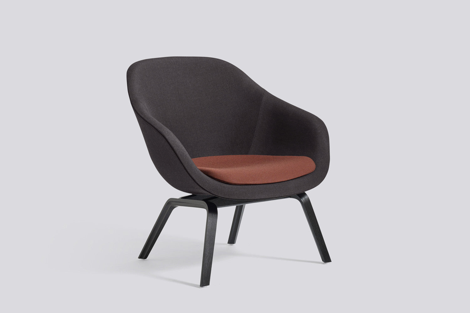 About A Lounge Chair AAL 83 upholstered dark colours and black stained oak legs About A Lounge Chair AAL 83 upholstered dark colours and black stained oak legs
