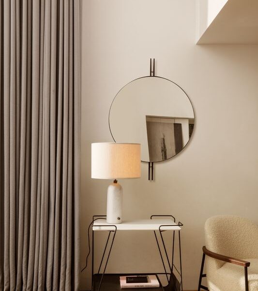 GravityTableLamp_MategotTrolley_IOIWallMirror_SejourLoungeChair_On-small